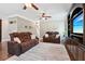 Inviting living room with hardwood floors, plush seating, and a custom entertainment center for relaxing at home at 615 Henderson Mill Rd, Covington, GA 30014