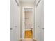 Neutral bathroom with wood-style floors, white trim, and white doors and walls at 1368 Poplar Pointe Se, Smyrna, GA 30082