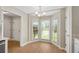 Charming kitchen nook with bay window and modern chandelier at 1368 Poplar Pointe Se, Smyrna, GA 30082