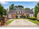 Brick townhouses with a shared driveway at 1368 Poplar Pointe Se, Smyrna, GA 30082
