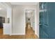 Inviting foyer with wood-look flooring and neutral paint at 1368 Poplar Pointe Se, Smyrna, GA 30082