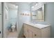 Bathroom featuring modern fixtures, vanity, and a toilet at 148 Bramble Oak Dr, Woodstock, GA 30188