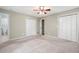Neutral bedroom with two closets and an en-suite bathroom at 148 Bramble Oak Dr, Woodstock, GA 30188