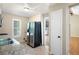 Bright kitchen with stainless steel appliances and tile floors at 148 Bramble Oak Dr, Woodstock, GA 30188