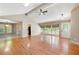 Bright living room with large windows, hardwood floors, and an open layout at 148 Bramble Oak Dr, Woodstock, GA 30188
