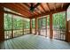 Relaxing screened-in porch with wooded views at 148 Bramble Oak Dr, Woodstock, GA 30188