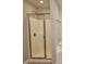 Bathroom features a shower with glass doors and new fixtures at 2141 Spikerush Way, Buford, GA 30519