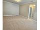 Large bonus room featuring neutral paint and plush carpeting at 2141 Spikerush Way, Buford, GA 30519