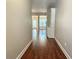 Entryway with hardwood floors and a view to open living areas and ample natural light at 2141 Spikerush Way, Buford, GA 30519