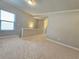 Neutral loft space with soft carpet and natural light at 2141 Spikerush Way, Buford, GA 30519