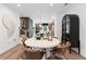 Chic dining area with unique round table, stylish chairs, and modern decor at 2535 Astaire Ct, Atlanta, GA 30318
