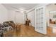 Cozy finished basement with a ceiling fan, tiled floors, and comfortable seating at 33 Evans Point Pt, Dallas, GA 30157