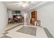 Spacious unfinished basement featuring tile flooring, ceiling fan, and ample room for various activities at 33 Evans Point Pt, Dallas, GA 30157