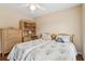 Comfortable bedroom featuring two twin beds, a dresser, and a desk with a hutch, offering ample storage space at 33 Evans Point Pt, Dallas, GA 30157