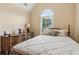 Bedroom features a four-post bed, wood floors and a large window at 33 Evans Point Pt, Dallas, GA 30157