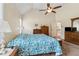 Traditional bedroom with vaulted ceiling, ceiling fan, and light-colored walls at 33 Evans Point Pt, Dallas, GA 30157