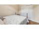 Bedroom with white closet and four-post bed with light color walls at 33 Evans Point Pt, Dallas, GA 30157