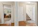 Inviting foyer with hardwood floors and staircase leading to the upper level of the home at 33 Evans Point Pt, Dallas, GA 30157