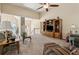 Spacious living room boasts vaulted ceilings, fireplace, a view to the upstairs, and ample natural light at 33 Evans Point Pt, Dallas, GA 30157