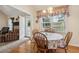 Charming breakfast nook with hardwood floors, window views, and access to the living room at 33 Evans Pt, Dallas, GA 30157