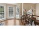 Sun-filled foyer features beautiful hardwood floors, large windows, and charming decor at 33 Evans Pt, Dallas, GA 30157