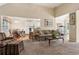 Spacious open living area with a view into the dining area and kitchen, featuring natural light at 33 Evans Pt, Dallas, GA 30157
