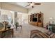 Open-concept living room with vaulted ceilings, comfortable furniture, and a view to the entryway at 33 Evans Pt, Dallas, GA 30157