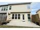 This backyard features a patio, and a well maintained lawn area at 5850 Shiloh Woods Dr, Cumming, GA 30040
