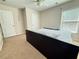 This bedroom features carpet flooring, natural light, and neutral colored walls at 5850 Shiloh Woods Dr, Cumming, GA 30040