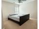 This bedroom features carpet flooring, natural light, and neutral colored walls at 5850 Shiloh Woods Dr, Cumming, GA 30040