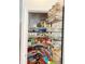 Organized pantry with shelving and storage baskets for efficient space use at 5850 Shiloh Woods Dr, Cumming, GA 30040