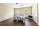 Neutral bedroom featuring hardwood floors, and natural light at 105 North River Dr # A, Atlanta, GA 30350