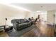 Open living space featuring laminate floors and neutral paint, providing space for relaxation and leisure at 105 North River Dr # A, Atlanta, GA 30350