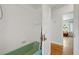 Bathroom with a vintage green bathtub and tiled walls at 1544 Brewer Sw Blvd, Atlanta, GA 30310