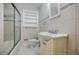 Well-lit bathroom featuring a vanity and shower with glass door at 1716 Beacon Hill Ne Blvd, Atlanta, GA 30329