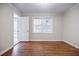 A bright bedroom featuring hardwood floors, and natural light at 1716 Beacon Hill Ne Blvd, Atlanta, GA 30329