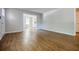 Spacious room featuring hardwood floors, white walls, and many entryways at 1716 Beacon Hill Ne Blvd, Atlanta, GA 30329
