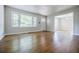 Bright living room featuring hardwood floors, large windows offering lots of natural light at 1716 Beacon Hill Ne Blvd, Atlanta, GA 30329