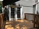 The back porch has double doors providing outdoor relaxation and privacy at 4433 Ford Pl, Snellville, GA 30039