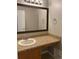 Bathroom vanity with a single sink, granite countertop, and neutral paint at 4433 Ford Pl, Snellville, GA 30039