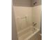 Bathroom with a standard white bathtub and shower combination at 4433 Ford Pl, Snellville, GA 30039