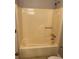 This bathroom boasts a shower-tub combination with updated fixtures and a functional design at 4433 Ford Pl, Snellville, GA 30039