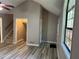 Open living room with stairs, luxury vinyl plank flooring, and plenty of natural light at 4433 Ford Pl, Snellville, GA 30039