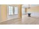 Spacious entryway showcasing hardwood floors, double doors, and an adjacent dining area at 543 Serene Waters Trl, Jonesboro, GA 30236
