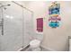 This bathroom features a glass shower and built-in towel rack at 10650 Colony Glen Dr, Johns Creek, GA 30022