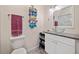 This bathroom features a vanity with granite countertop and glass bowl sink at 10650 Colony Glen Dr, Johns Creek, GA 30022