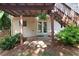 Backyard featuring an exit door to the basement and a set of stairs to the deck at 2577 Abbotts Glen Nw Dr, Acworth, GA 30101