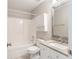 Well-lit bathroom features white cabinets, granite countertops and a shower/tub combo at 2577 Abbotts Glen Nw Dr, Acworth, GA 30101