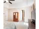 Spacious bedroom featuring tray ceilings, neutral carpeting and a large wardrobe at 2577 Abbotts Glen Nw Dr, Acworth, GA 30101