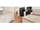 Bright kitchen showcasing white cabinetry, modern appliances, and wood floors at 2577 Abbotts Glen Nw Dr, Acworth, GA 30101